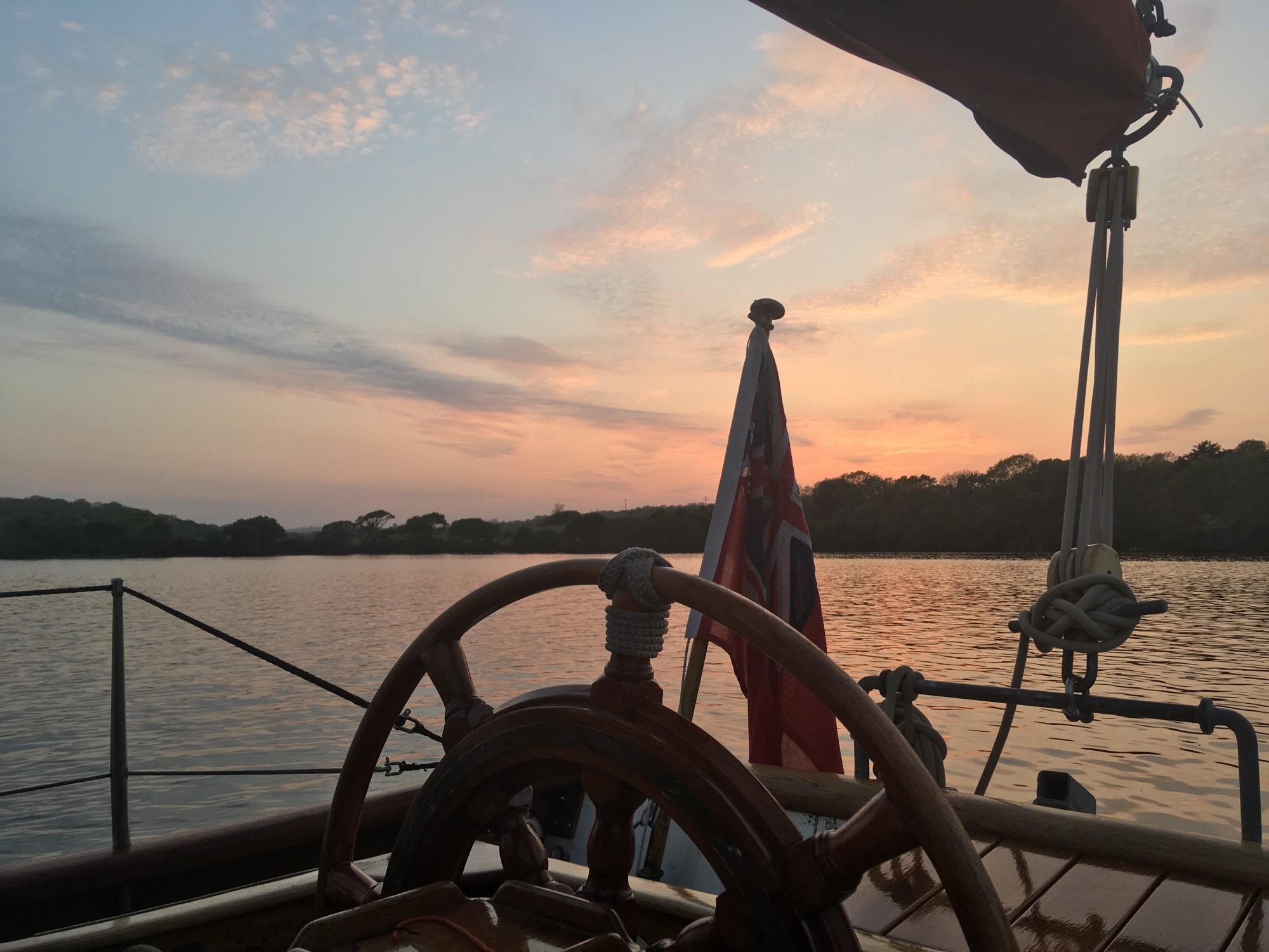 Sunset view from the cockpit of a boat