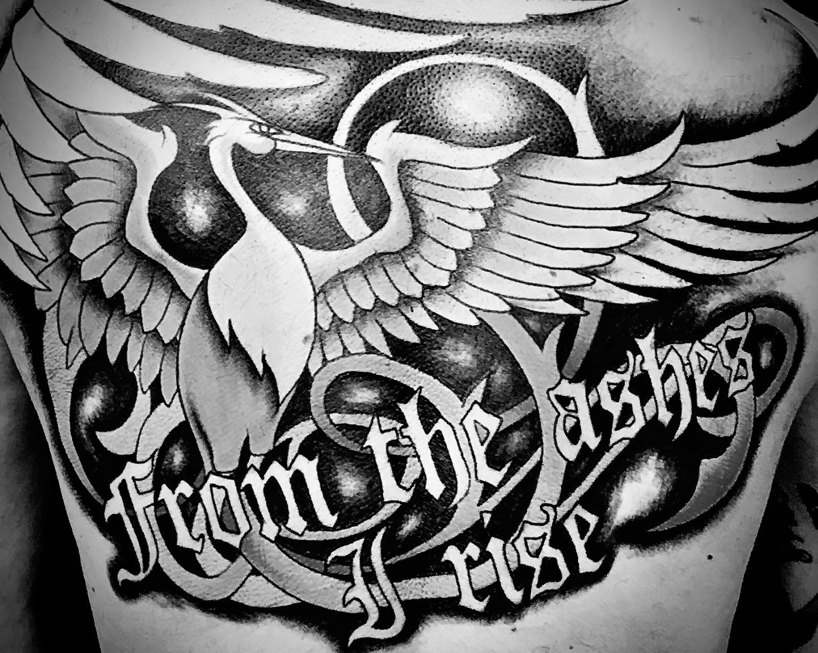Tattoo of a bird with the text From the ashes I rise